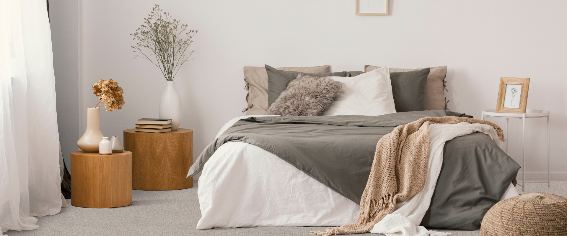 grey bedroom carpet with wooden tables